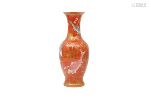A CHINESE GILT-DECORATED SALMON-RED 'FISH' VASE. Qing Dynast...