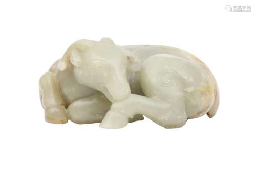 A CHINESE PALE CELADON JADE CARVING OF A GOAT. Qing Dynasty,...