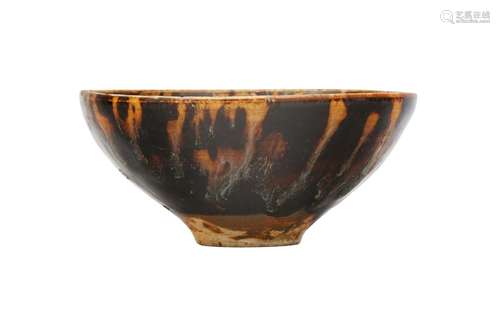 A SMALL CHINESE RUSSET-SPLASHED TEA BOWL. The sides under a ...