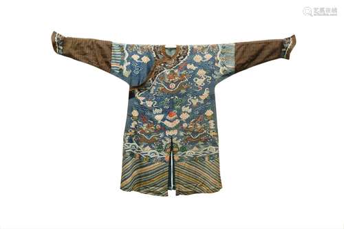 A CHINESE BLUE-GROUND SILK KESI WOVEN 'NINE DRAGON' ROBE, JI...