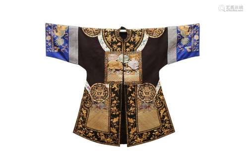 A CHINESE OFFICIAL'S BLACK-GROUND ROBE. Qing Dynasty. The bl...