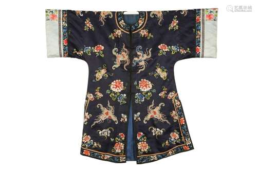 A CHINESE EMBROIDERED BLUE-GROUND SILK LADY'S ROBE. Circa ea...