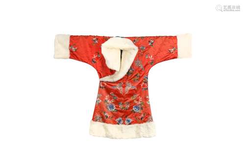 A CHINESE FUR-LINED RED-GROUND EMBROIDERED SILK LADY'S ROBE....