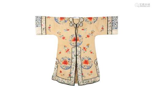 A CHINESE APRICOT-GROUND EMBROIDERED SILK LADY'S ROBE. Qing ...