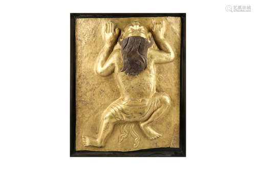 A LARGE TIBETAN GILT-BRONZE PLAQUE. Tibet, 19th Century. Dec...