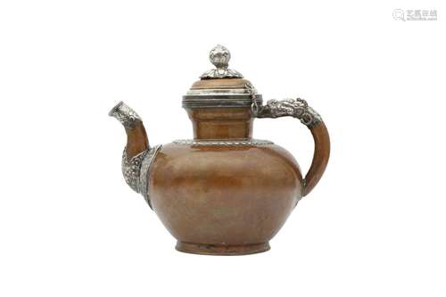 A TIBETAN COPPER BUTTER-TEA TEAPOT AND COVER. Tibet, 19th Ce...