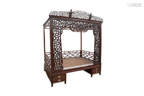 A LARGE CHINESE ROSEWOOD AND MIXED WOOD FOUR POST CANOPY BED...