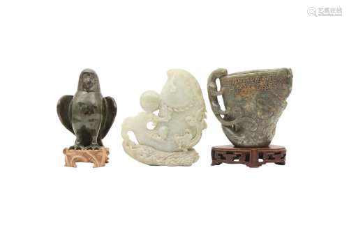 TWO CHINESE GREEN JADE VESSELS AND A 'CARP' CARVING. Compris...