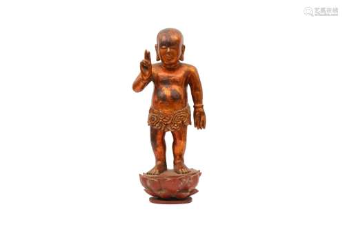 A CHINESE GILT-LACQUER FIGURE OF THE INFANT BUDDHA. Standing...