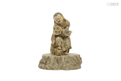 A CHINESE SOAPSTONE FIGURE OF LIUHAI. Qing Dynasty