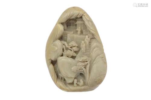 A CHINESE CARVED JADE 'LANDSCAPE' BOULDER CARVING. The ovoid...