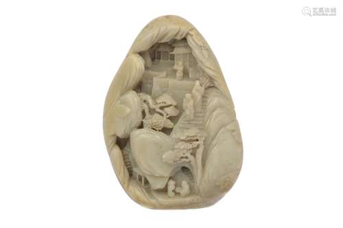 A CHINESE CARVED JADE 'LANDSCAPE' BOULDER CARVING. The ovoid...