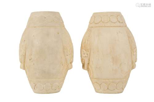 A PAIR OF CHINESE WHITE MARBLE STANDS. Each carved in form o...