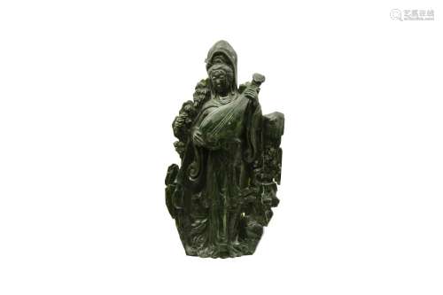 A VERY LARGE CHINESE SPINACH JADE FIGURE OF GUANYIN. Carved ...