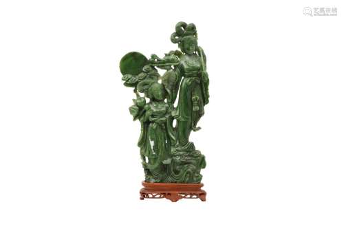 A LARGE CHINESE SPINACH JADE CARVING OF TWO CELESTIAL LADIES...