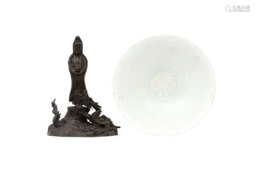 A CHINESE QINGBAI BOWL AND A JAPANESE BRONZE FIGURE OF GUANY...