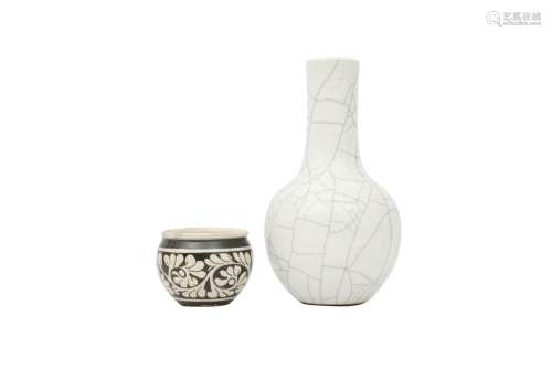 A CHINESE CRACKLE-GLAZED BOTTLE VASE AND A CIZHOU WASHER. Th...