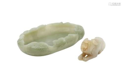 A CHINESE PALE CELADON JADE 'LEAF' WASHER AND A 'LION DOG' C...