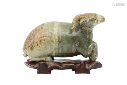 A CHINESE PALE CELADON JADE ARCHAISTIC MODEL OF A RAM. Recum...