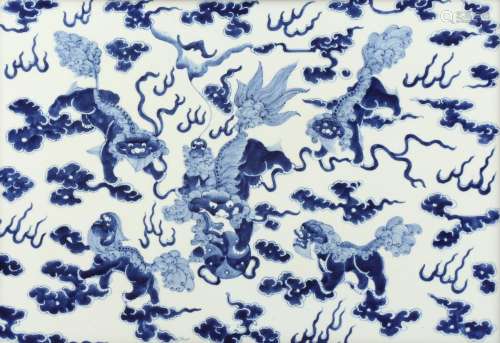 A LARGE CHINESE BLUE AND WHITE 'BUDDHIST LION DOGS' PLAQUE. ...