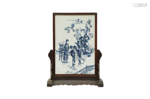 A CHINESE BLUE AND WHITE 'LADIES' PANEL. Painted with two ma...