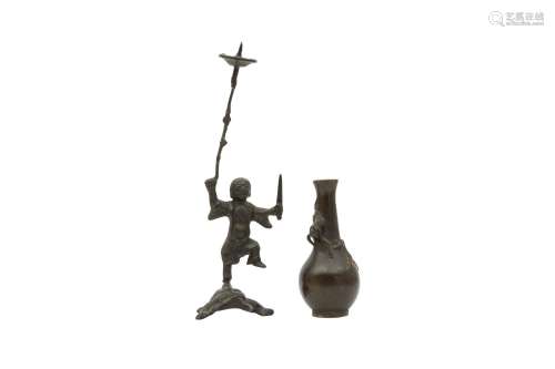 A CHINESE BRONZE 'LIU HAI' CANDLE STICK AND A SMALL VASE. Qi...