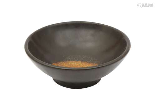A CHINESE BLACK-GLAZED 'LEAF' BOWL. Of rounded conical shape