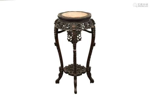 A CHINESE MARBLE-INLAID JARDINIERE STAND. The lobed top set ...
