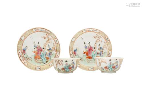 A PAIR OF CHINESE FAMILLE ROSE CUPS AND SAUCERS. Qing Dynast...