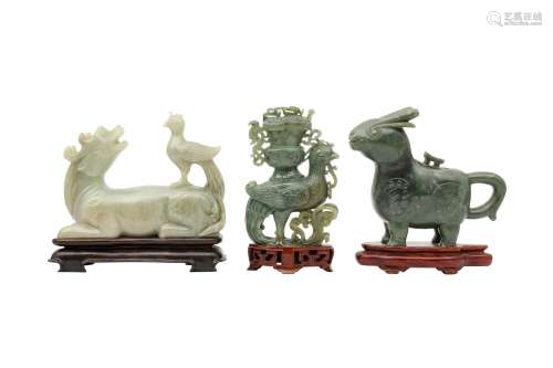 TWO CHINESE SPINACH-GREEN JADE 'ANIMAL' VESSELS AND COVERS A...