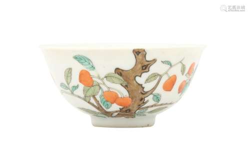 A CHINESE FAMILLE ROSE 'PEACH' BOWL. The rounded sides decor...