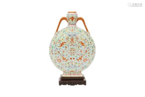 A CHINESE FAMILLE ROSE TURQUOISE-GROUND MOON FLASK. The circ...