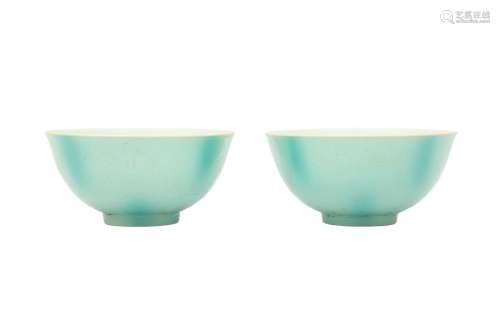 A PAIR OF CHINESE GREEN-GLAZED INCISED 'DRAGON' BOWLS. The r...