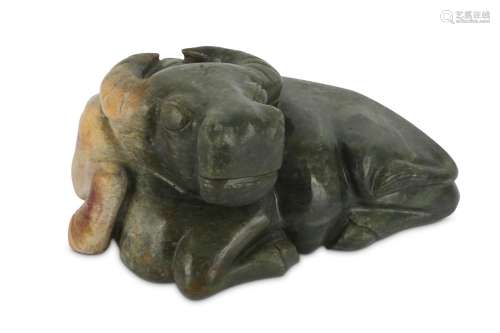 A CHINESE CELADON JADE MODEL OF AN OX. Lying on his side