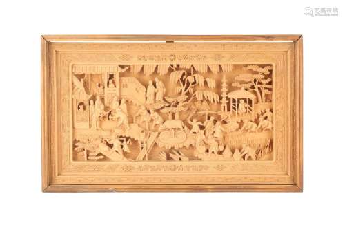 A CHINESE SANDALWOOD PANEL. Intricately carved with figures ...
