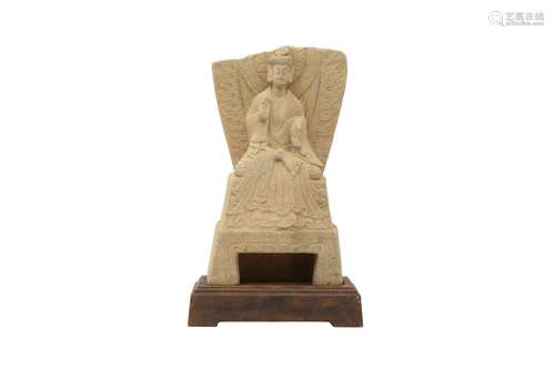 A CHINESE STONE CARVING OF A BUDDHA. Carved seated cross-leg...