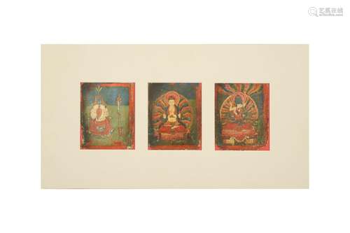 A SET OF THREE TIBETAN DEVOTIONAL PAINTINGS