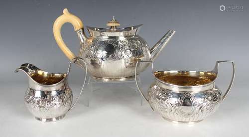 A George III silver circular teapot and two-handled sugar bo...