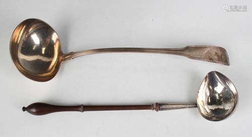 A George II silver punch ladle with turned wood handle