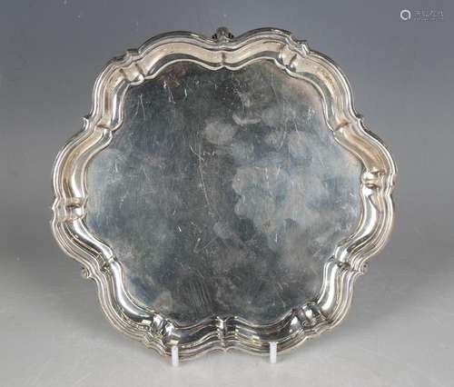 A George V silver petal rimmed circular card salver