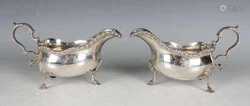 A pair of George III silver sauceboats