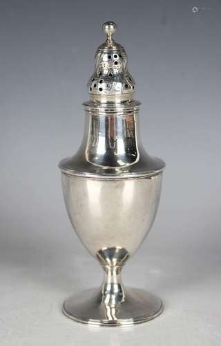 A George III silver baluster sugar caster with pierced cover...