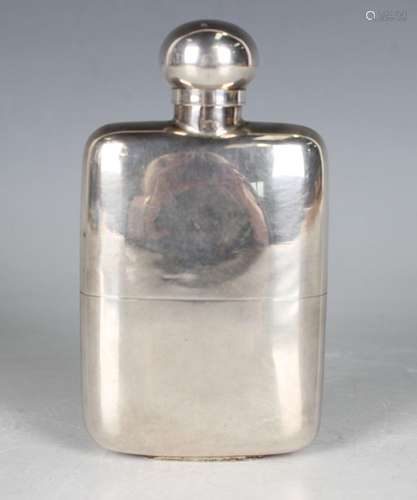 A late Victorian silver hip flask of curved rectangular form...