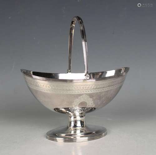 A George III silver oval boat shaped bonbon basket with reed...