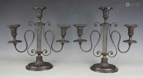 A pair of early 20th century plated lyre three-light candela...