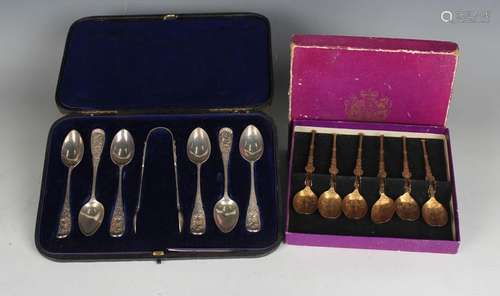 A set of six late Victorian silver teaspoons with scroll dec...