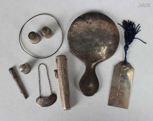 A small group of silver items