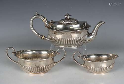 A late Victorian silver three-piece bachelor's tea set of ov...