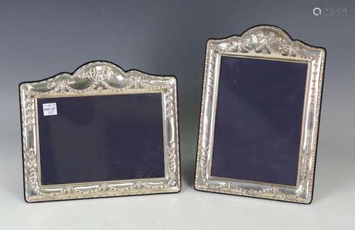 Two Elizabeth II silver mounted shaped rectangular photograp...