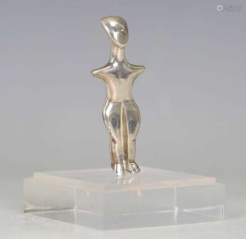 A modern silver diminutive figure of a stylized nude